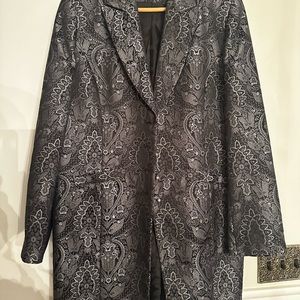 New never won jacket black and silver.